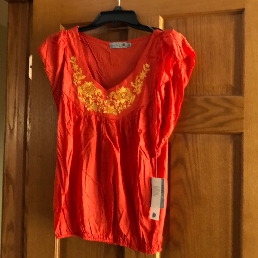 Brand new ladies orange cap sleeve top
